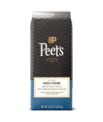 Peet's Coffee Middle Ground medium roast half-caff coffee 16 oz coffee in a blue bag