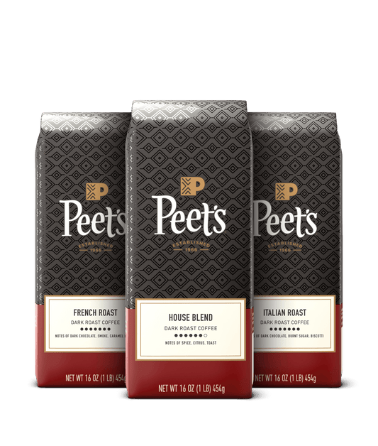 Three Peet's coffee bags with different roast types on a black background