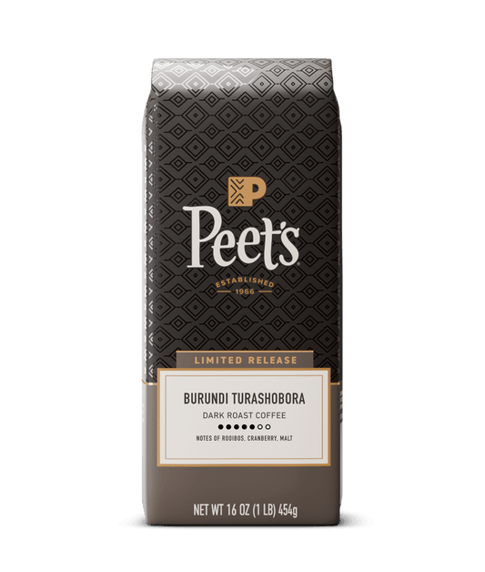 Peets Burundi Turashobora dark roast coffee in a 16 oz bag, featuring a dark brown patterned design with gold and white text.