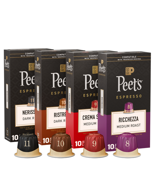 Four boxes of Peet's Espresso capsules with different roast levels on a black background